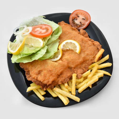 Frisch paniertes Schnitzel bei Schnitzel Plaza Ketis in Rüti